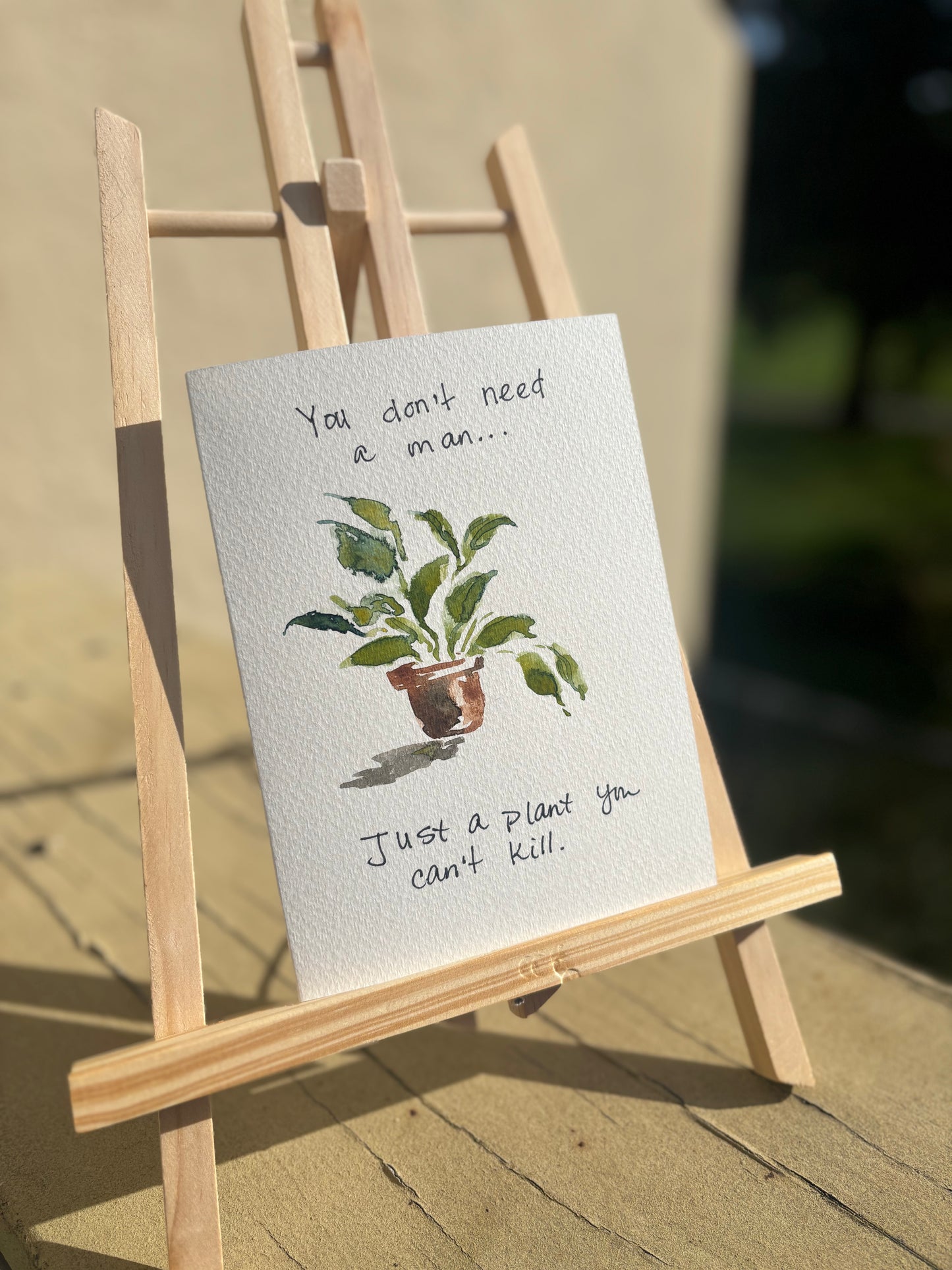 Card - You don't need a man, just a plant you can't kill.